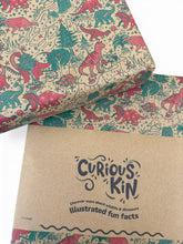 Load image into Gallery viewer, Christmas Dinosaur Recycled Wrapping Paper