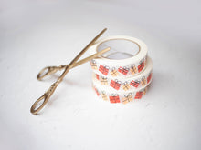 Load image into Gallery viewer, Decorative tape with gift box pattern and scissors on a light gray background
