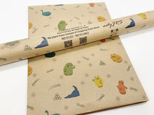Load image into Gallery viewer, Christmas Dogs and Cats Snowball Gift Wrap - Recycled Kraft Wrapping Paper

