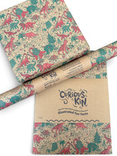 Load image into Gallery viewer, Christmas Dinosaur Recycled Wrapping Paper
