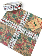 Load image into Gallery viewer, Christmas Dinosaur Recycled Wrapping Paper
