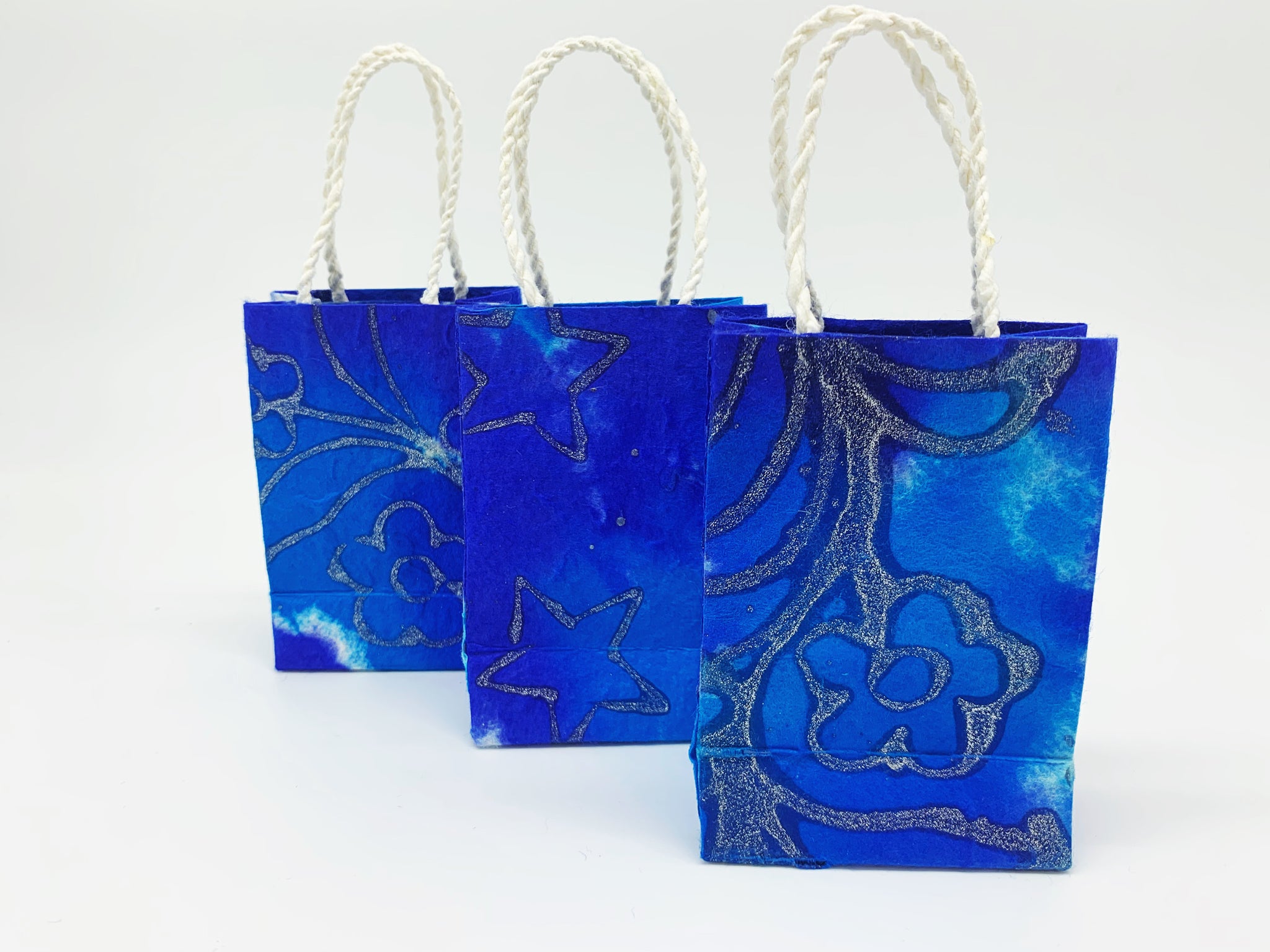 12 pack blue holographic gift bags medium 27 cm x 23 cm