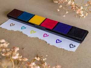 mini ink stamp kit with brown blue yellow pink purple and brown ink pads