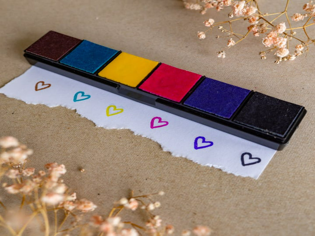 mini ink stamp kit with brown blue yellow pink purple and brown ink pads